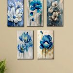 Set of 5 blue floral wall art frames arranged on wall in modern interior